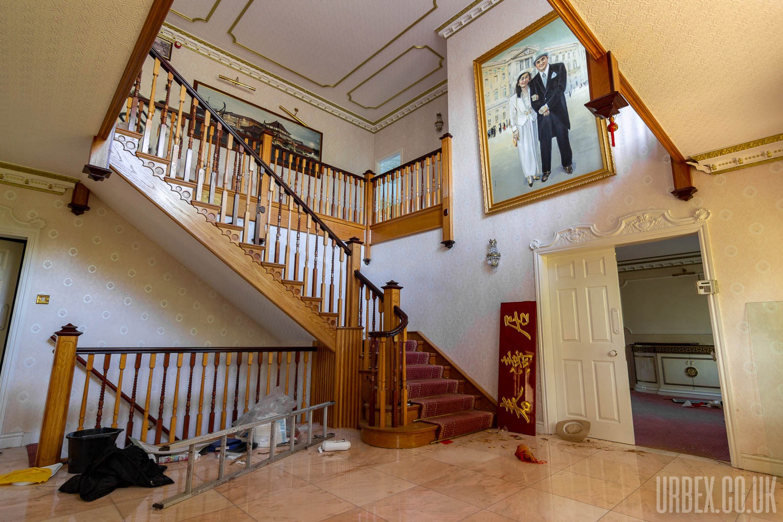 The Entrance hall of the abandoned mansion featuring a big painting of Jason Tsai